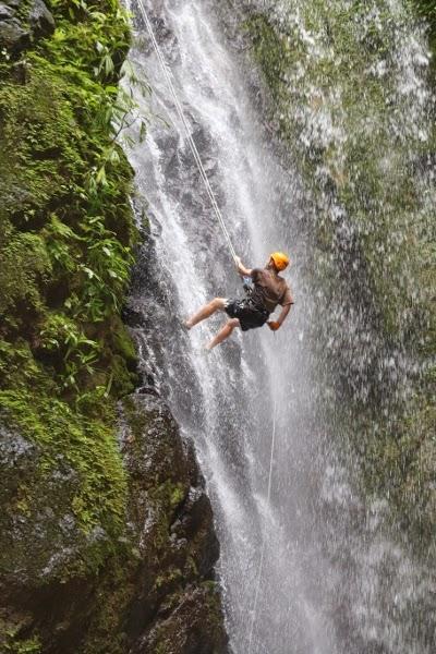 Rapelling down a waterfall in Costa Rica