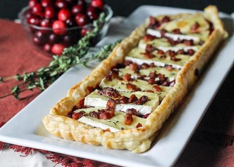 This Cranberry Brie Tart with Pancetta & Thyme is a unique appetizer that's perfect for the holidays! It's a delicious twist on a traditional baked brie.