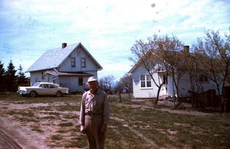 Carl in front of his house and the Damgaard house in Britton, South Dakota