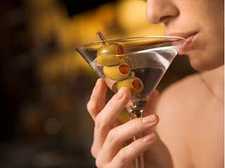 Heavy Drinking Impairs Serotonin Function More Rapidly in Women