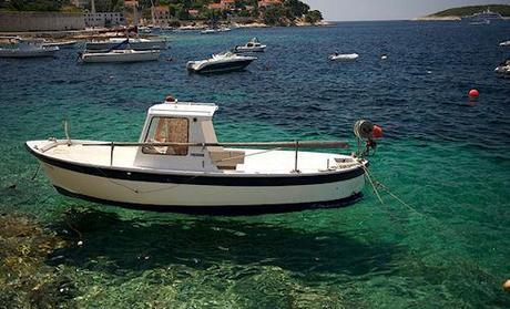 Boats In Clear Water Look As If They Float In The Air