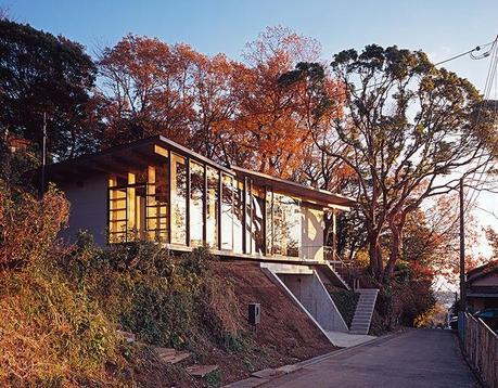 Modern Japanese hilltop home facade steel framed doors and windows
