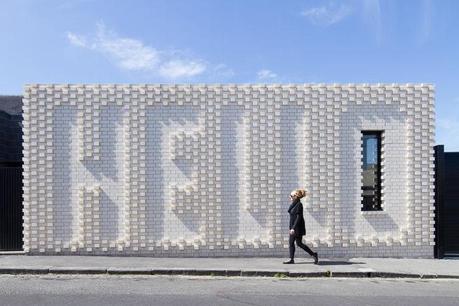 Hello house in Melbourne with brick wall