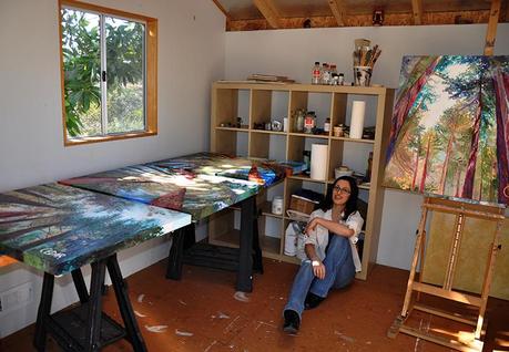 Artist Cedar Lee in her painting studio with her large-scale oil paintings of the redwood forest. January 2015.