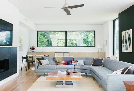 Boston prefab guest home and pool has a great room with vintage furniture