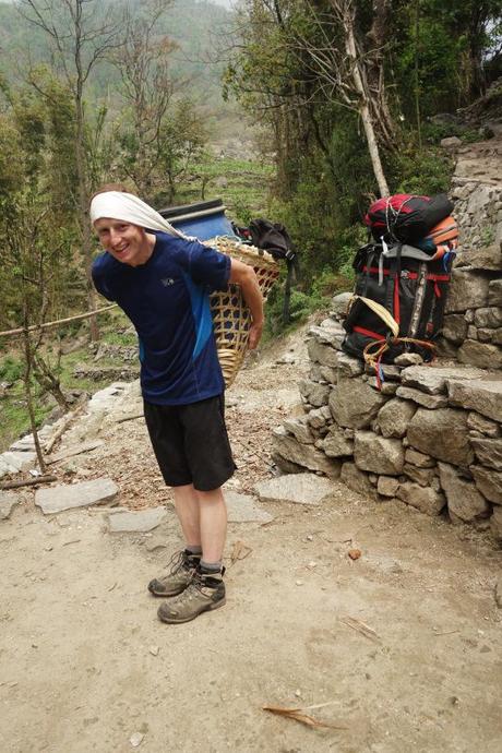 We encountered many porters during our trek as they would run up and down the mountain supplying different tea houses and many climbers, and a few Trekkers, relied upon these for food. Kevin tried their basket on, though it would take a lot of practice to hike with it! 