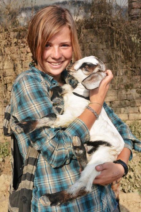 Me and one of the many goats I've tried to take with me!
