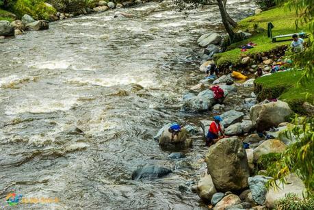 washing clothes in a river in Cuenca