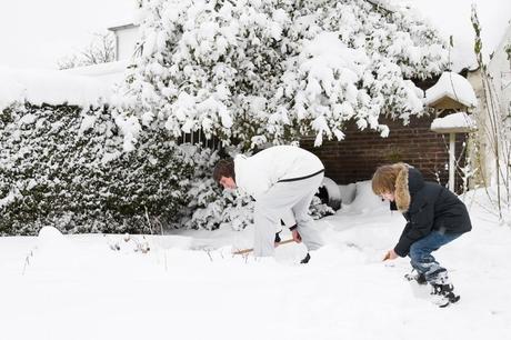 bigstock-Father-And-Son-Shoveling-Snow--71804719
