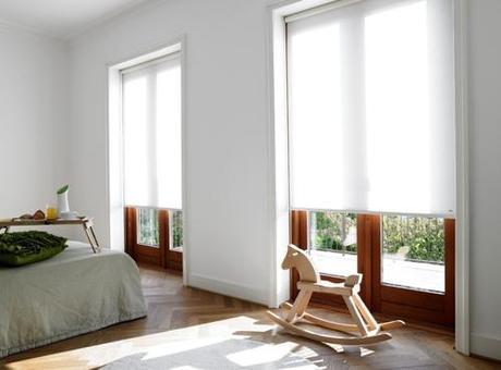 roller-shades-over-wood-french-windows