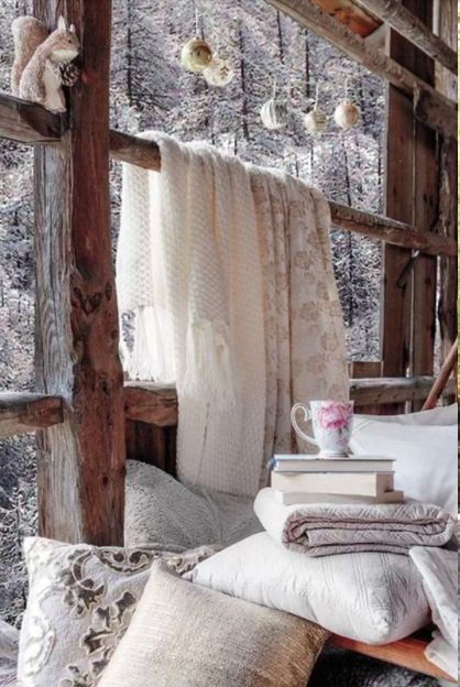 Layered winter white pillows and blankets