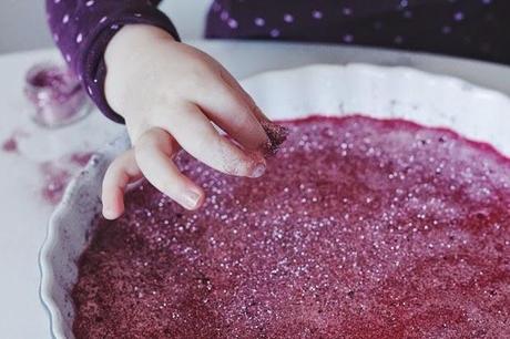 homemade raspberry yogurt gummy glitter hearts.