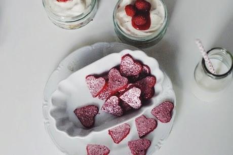 homemade raspberry yogurt gummy glitter hearts.