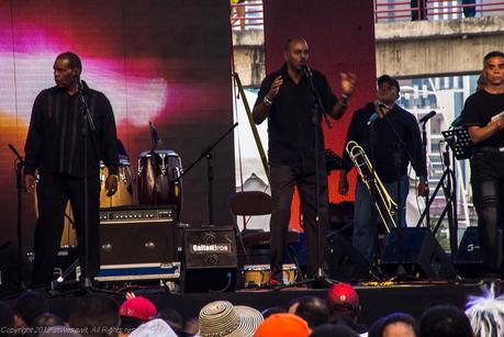 Musicians performing on stage for Carnival partiers