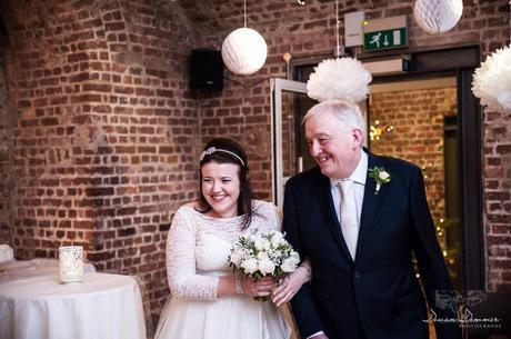 Bride and her father chatting