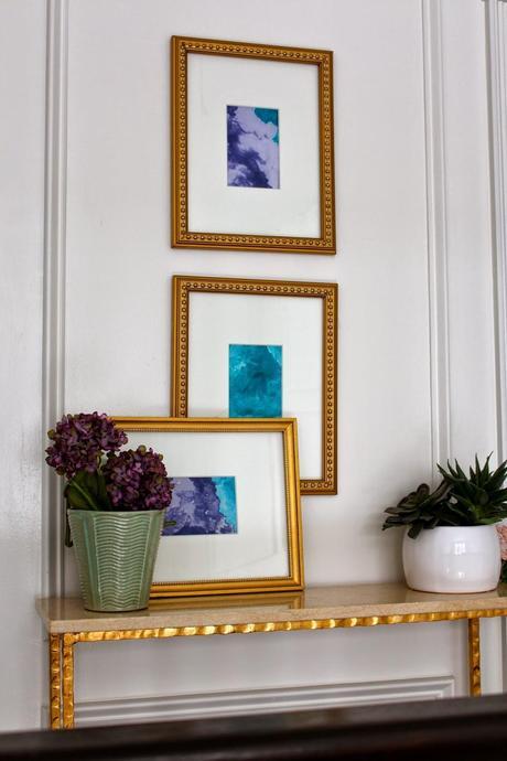 Our Foyer Gallery Wall Over the New Picture Frame Moldings