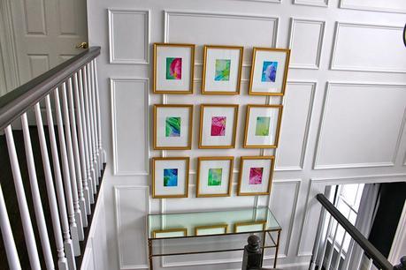 Our Foyer Gallery Wall Over the New Picture Frame Moldings