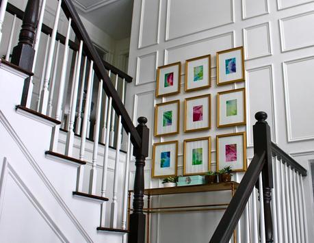 Our Foyer Gallery Wall Over the New Picture Frame Moldings