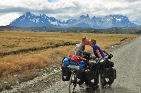 A bike packed full of food, some mountains, and a boy equals one happy girl!