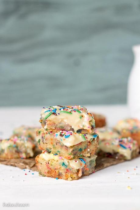 These Funfetti White Chocolate Blondies taste like a fudgy Funfetti cake, made even more delicious by a white chocolate ganache and lots of sprinkles! This easy recipe uses a secret ingredient to get that special cake mix flavor.
