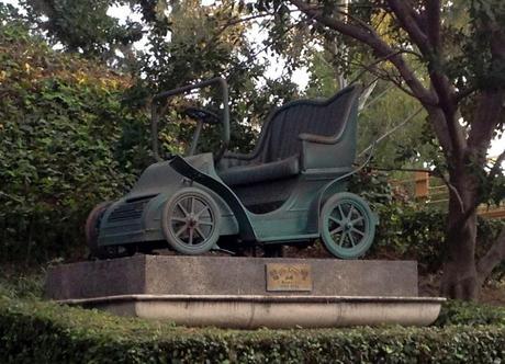 Bronzed cars at Disneyland, a Mr Toads wild ride, and an Autotopia car