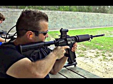 Shooting w Bushmaster .223 5.56mm AR-15 spread at 100 yards