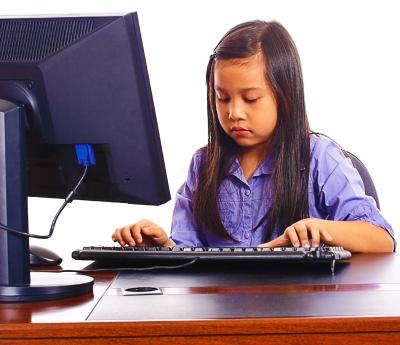 Child Learning How to Use the Computer