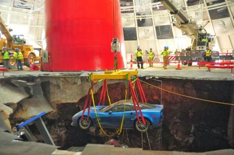 The Corvettes are getting pulled out of the sinkhole