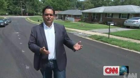 CNN reporter in front of Darren Wilson's house