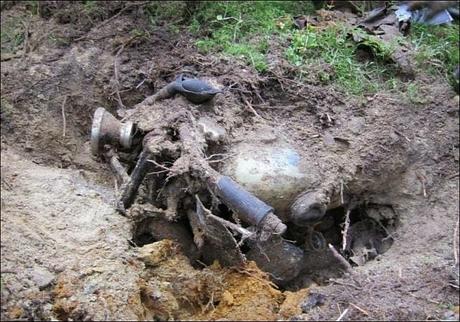 WW2 motorcycle found buried or sunken out in the woods