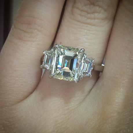 Emerald Cut engagement ring with trapezoid cut side stones