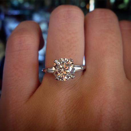Round Brilliant Engagement Ring with Tapered Baguettes