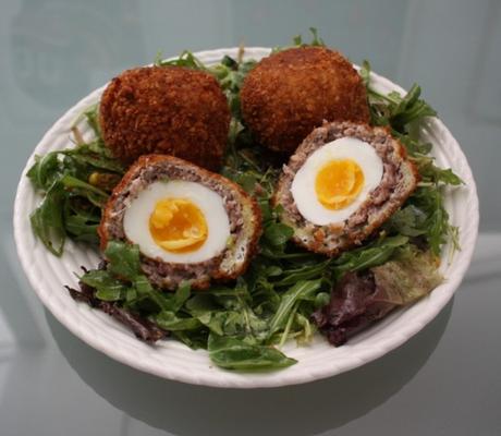 Scotch eggs on salad