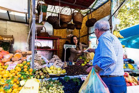 Man buying food in Split's farmer's market