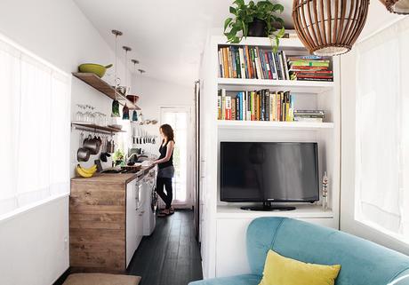 Galley-style kitchen opens up into the modern living space. 