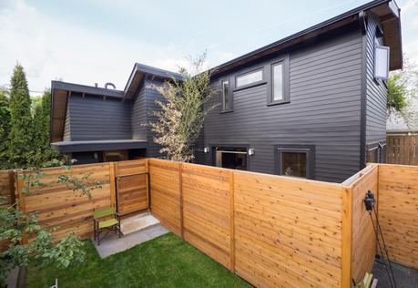 Small Portland home with black-painted cedar exterior