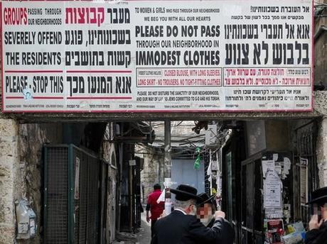 Jerusalem beings removing illegal tzniyus signs