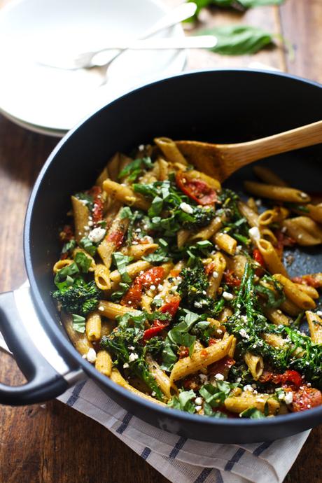 20-Minute Lemon Pesto Penne - baby broccoli, oven roasted tomatoes, pesto, fresh lemon, feta, and basil. My husband says it's his new favorite! 350 calories. | pinchofyum.com