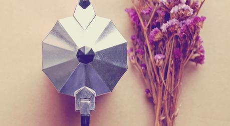 Delicious and fresh blueberry pie Italian coffee maker and flower with retro filter effect