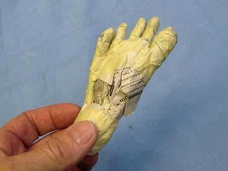 A Paper Mache Dark Butterfly- hands and feet