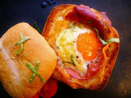 fancy breakfast or brunch? baked egg and proscuitto in a bread roll