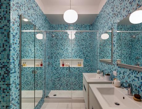Blue mosaic tiled bathroom