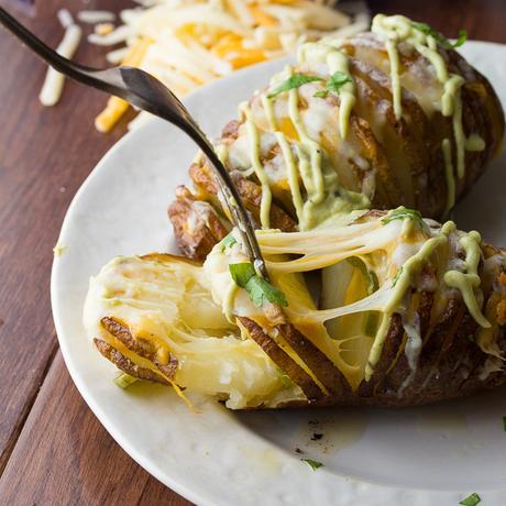 CHEESY JALAPEÑO HASSELBACK POTATOES WITH AVOCADO CREAM SAUCE Cheesy Jalapeño Hasselback Potatoes with Avocado Cream Sauce | sweetpeasandsaffron.com @sweetpeasaffron