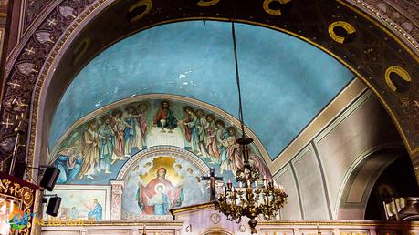 fresco and chandelier inside Nafplio Cathedral