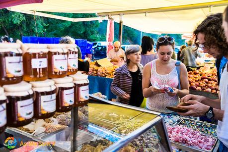 Woman making a purchase at a stall