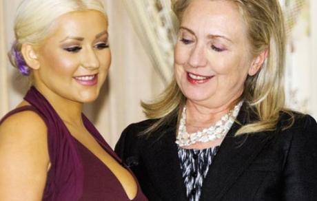 Hillary Clinton is transfixed by singer Christina Aguilera's boobs