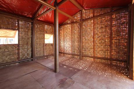 Woven-bamboo sliding allows light into the structure. 