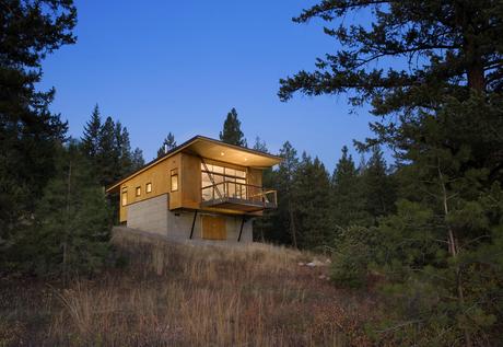 Pine Forest Cabin exterior during evening