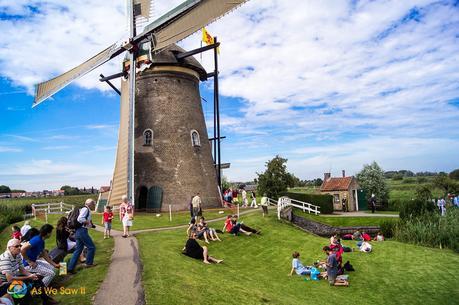 tourists outside a Kinderdijk windmill