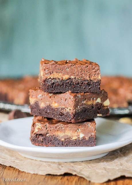 These Peanut Butter Crunch Brownies are a fudge brownie topped with peanuts, peanut butter cups, and a chocolate peanut butter Rice Krispie ganache. These are for the chocolate peanut butter lovers!